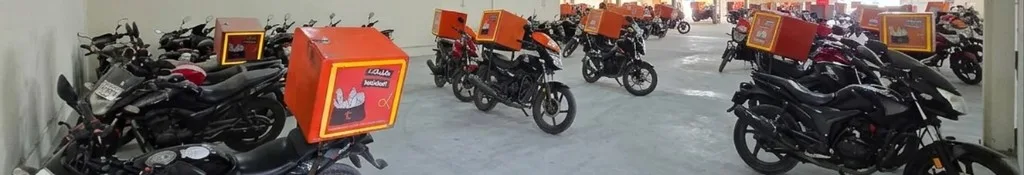 Indoor shaded parking for delivery motorcycles