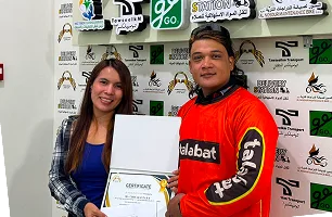 Team member receiving an award certificate