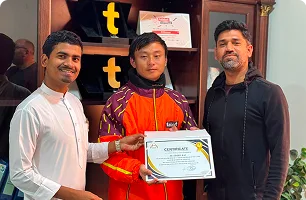 Couriers celebrating with certificate